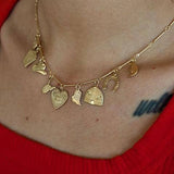 Vintage Brass Heart Charm with Flowers
